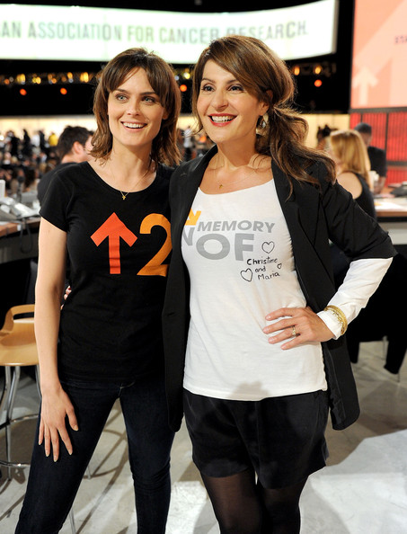 In this handout photo provided by Getty Images, actors Emily Deschanel (L) and Nia Vardalos pose during Stand Up To Cancer at Sony Pictures Studios on September 10, 2010 in Culver City, California.