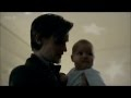 Matt Smith holding a baby and singing